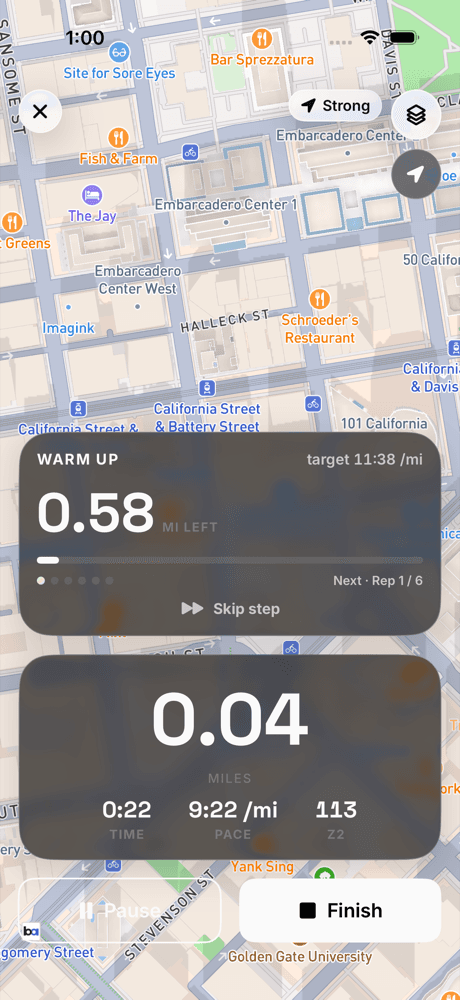 Live guided run: warm-up step with target pace, distance remaining, live heart rate in zone 2
